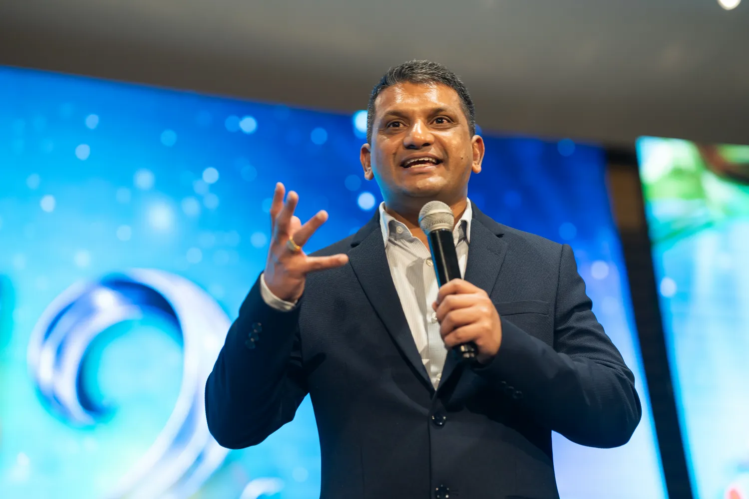 DXN – momento destacado del evento – fotografía corporativa en Bogotá
