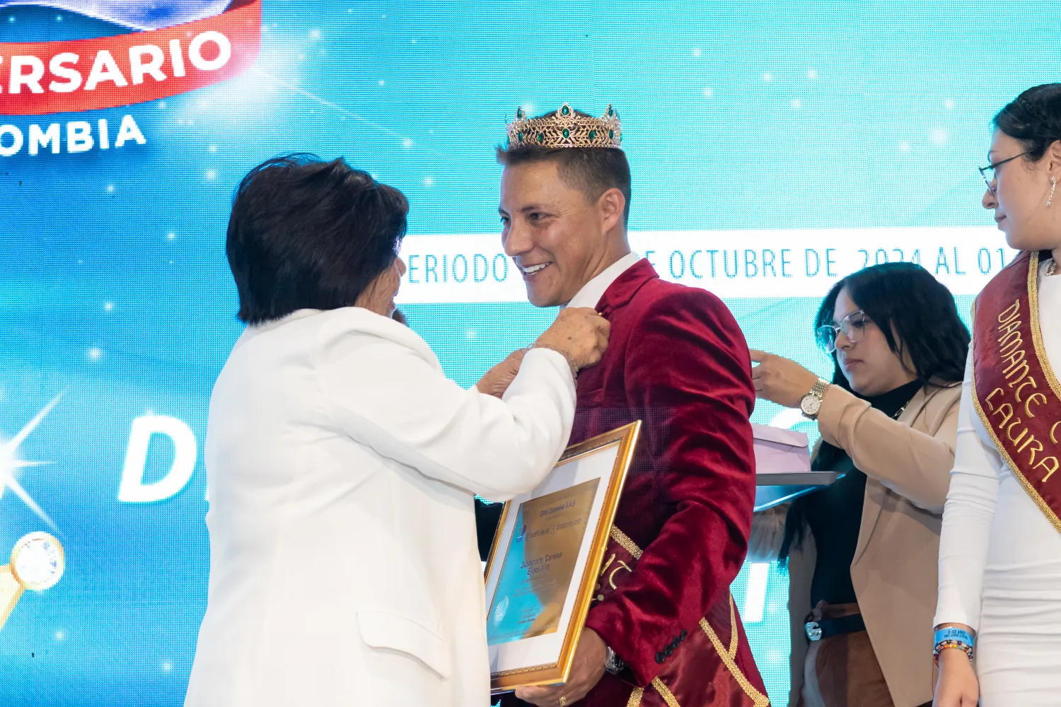 DXN – asistentes en el salón – fotografía corporativa en Bogotá